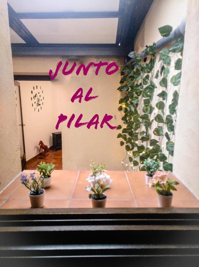 Junto Al Pilar *
